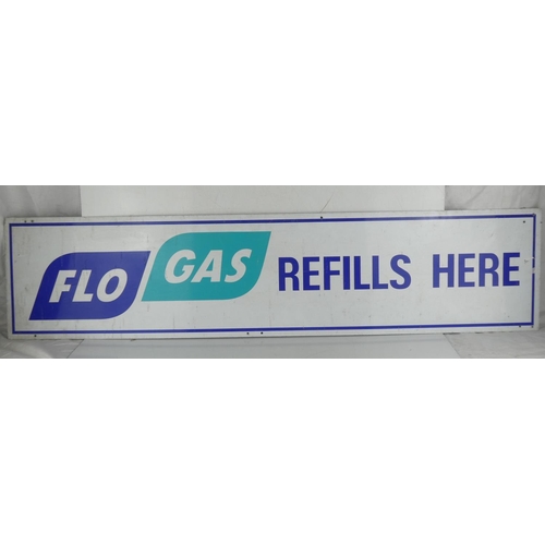 1 - A 'Flo Gas Refills Here' advertising metal sign.