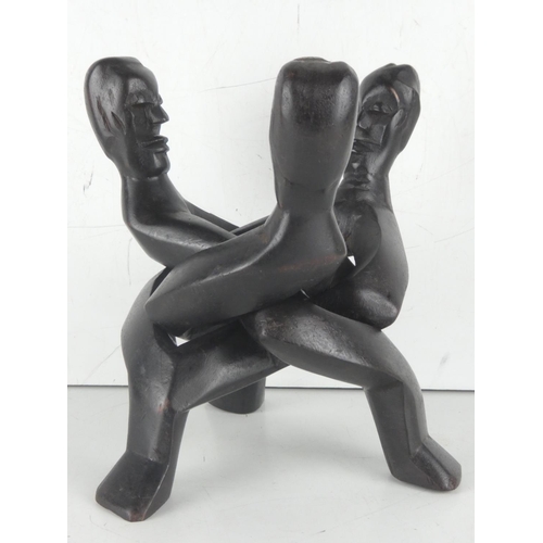 11 - A wooden figure head pot stand.