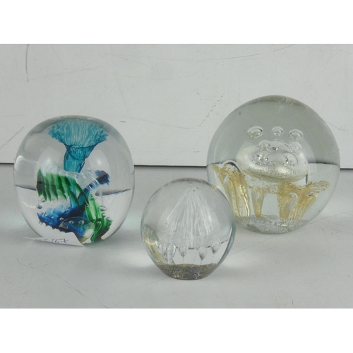 14 - A large vintage Irish Jerpoint Glass Studio paperweight and two others.