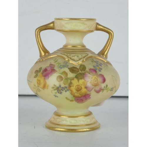 19 - A Royal Worcester hand painted miniature two handled pot (a/f). Measuring 8cm tall.