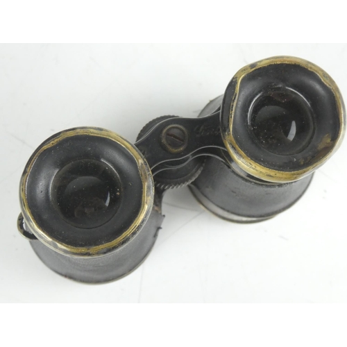 25 - A vintage leather cased pair of binoculars 'The Army - Gabrielle Paris'.