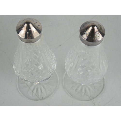 33 - A pair of Waterford crystal salt and pepper shakers.