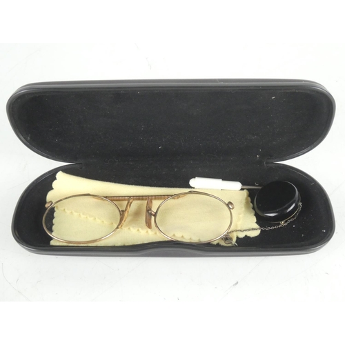 44 - A pair of antique reading glasses in case.