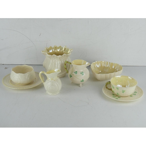 46 - A collection of Belleek pottery (jug a/f).