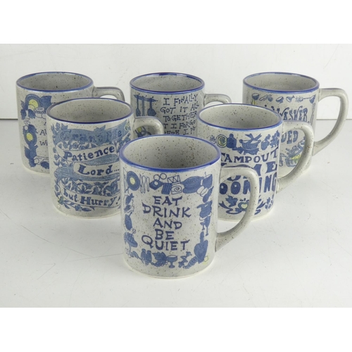 49 - An unusual set of six Japanese glazed pottery mugs.