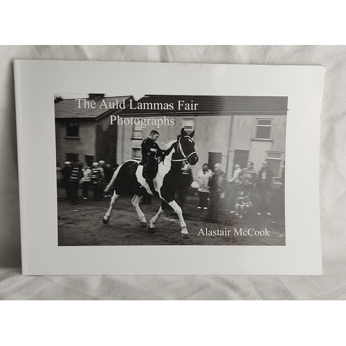 52 - A signed copy of The Auld Lammas Fair Photographs by Alastair McCook