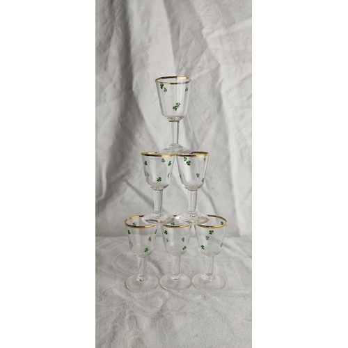 53 - A set of six vintage sherry glasses with shamrock decoration.