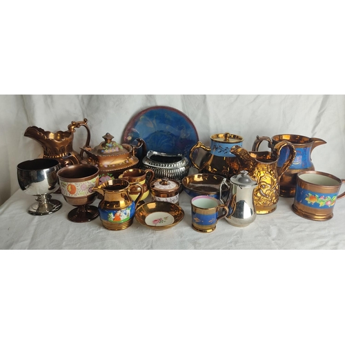 62 - A large collection of antique lustre ware.