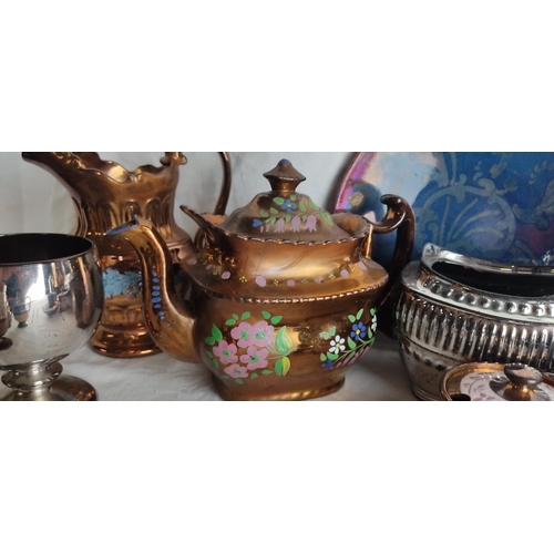 62 - A large collection of antique lustre ware.