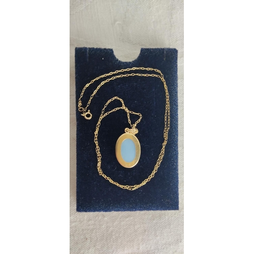 68 - A 9ct gold cameo pendant and chain.