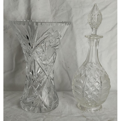 78 - An etched lead crystal vase and similar decanter.