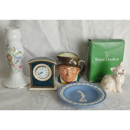 87 - A boxed Royal Doulton cat ornament, a Royal Doulton Biltmore clock and more.