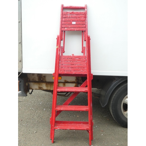 100 - A vintage folding wooden ladder.