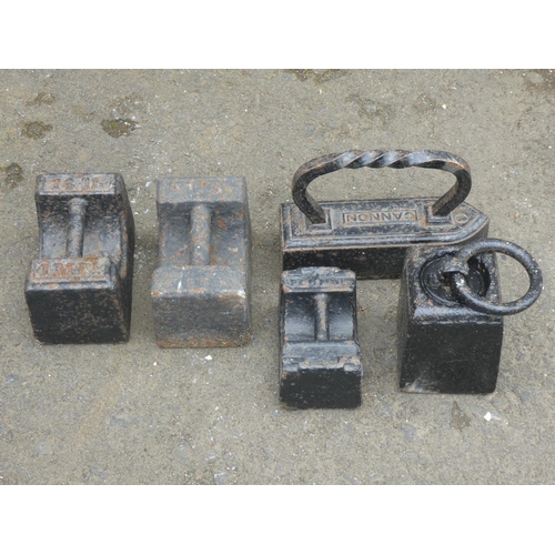 109 - An antique 'Cannon' cast iron, two 14lb cast iron weights and more.