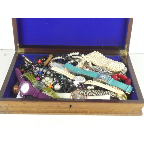 124 - An antique oak canteen of cutlery box and a large lot of assorted costume jewellery.