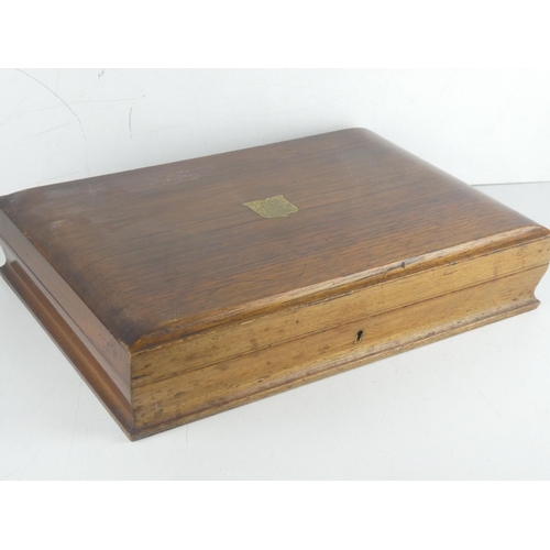 124 - An antique oak canteen of cutlery box and a large lot of assorted costume jewellery.