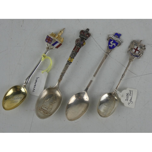 148 - Four Sterling silver souvenir spoons.