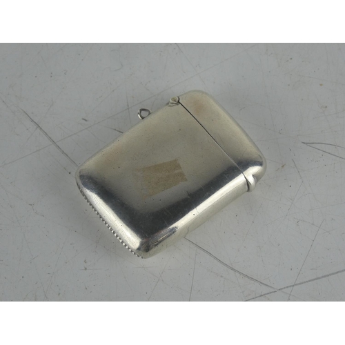 150 - A Sterling silver vesta case.