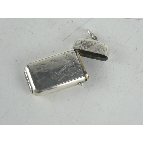 157 - A stunning Sterling silver vesta case with Oriental design.