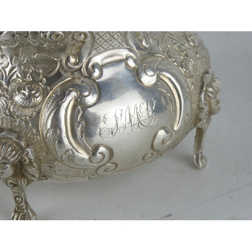 163 - A superb & highly decorative Irish silver jug produced by West & Son. Weighing 377.5 grams.