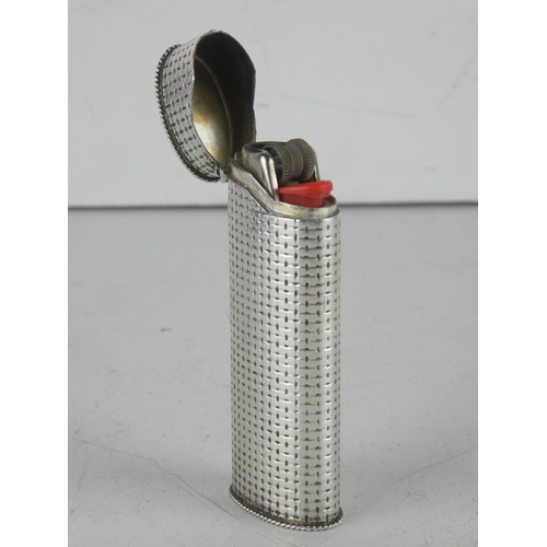 170 - A vintage Sterling silver lighter case.