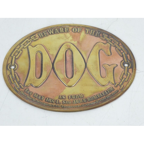 173 - A brass plaque, 'Beware of the Dog'.