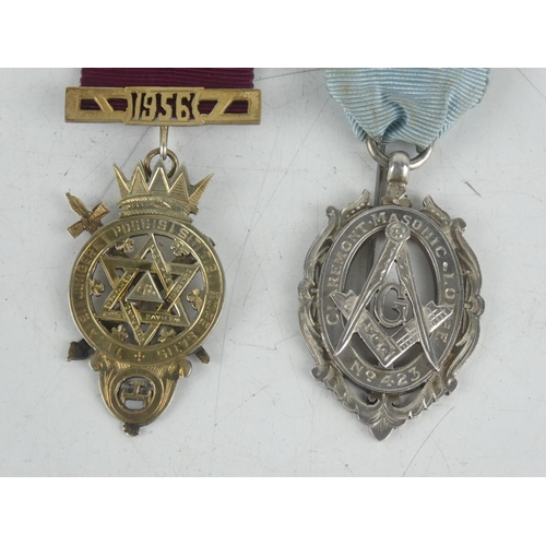 176 - A Sterling silver masonic medal and ribbon dated 1934 - Claremont Masonic Lodge number 423, presente... 