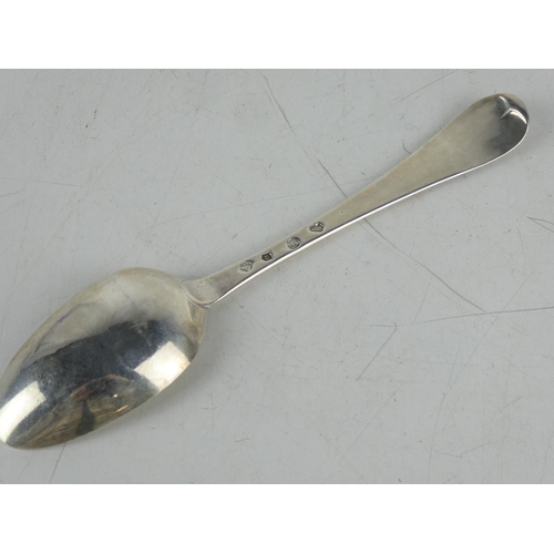 179 - An antique George II Irish silver serving spoon by maker Christopher Skinner, Dublin 1754, measures ... 