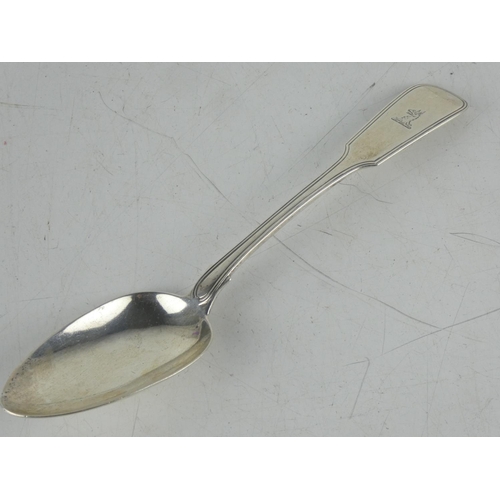 180 - An antique Irish silver serving spoon by maker James England, Dublin 1818, measures 23cm.