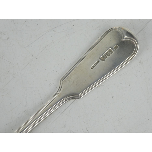 180 - An antique Irish silver serving spoon by maker James England, Dublin 1818, measures 23cm.