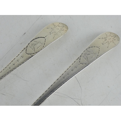 181 - A pair of antique Irish silver serving spoons by maker John Power, Dublin 1793, measures 25cm.