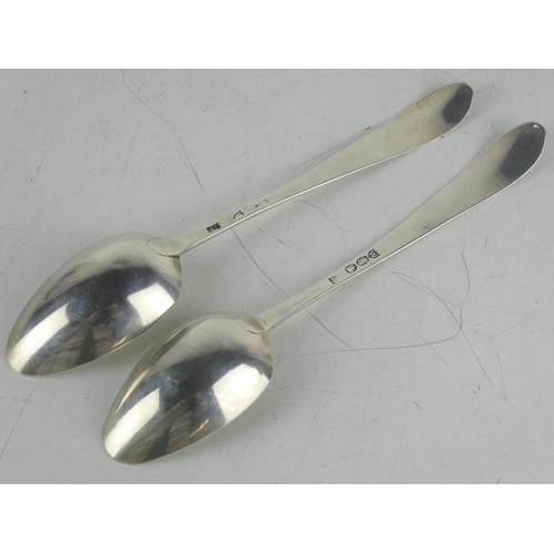 181 - A pair of antique Irish silver serving spoons by maker John Power, Dublin 1793, measures 25cm.