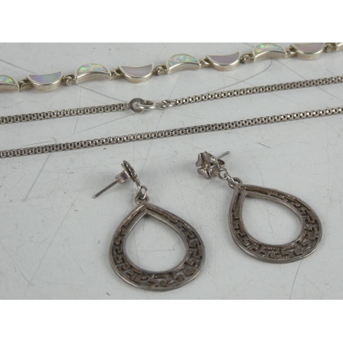 182 - A Sterling silver necklace, bracelet and a pair of earrings.