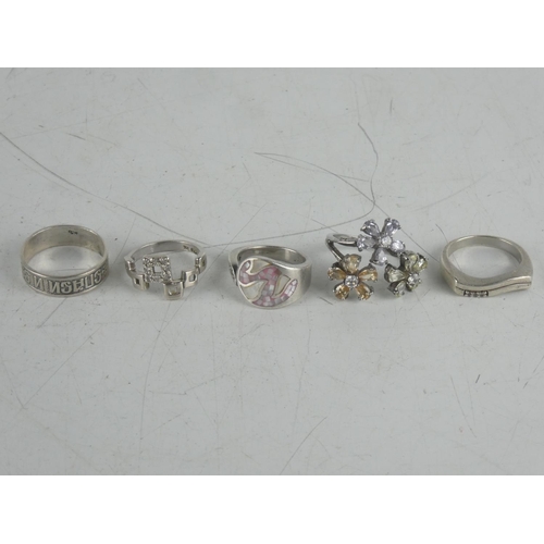 183 - Four Sterling silver dress rings and another.