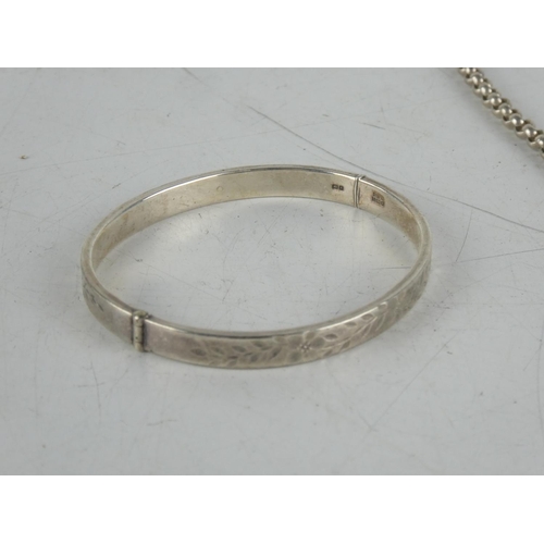 184 - A Sterling silver engraved bangle and  Sterling silver necklace.