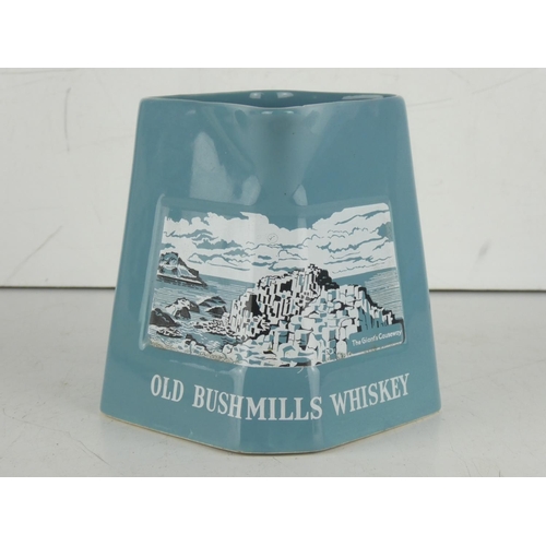 195 - A vintage Wade 'Old Bushmills' whiskey pub jug.