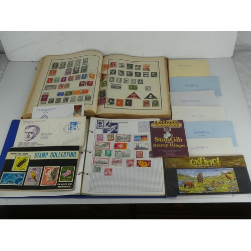 211 - A vintage Stanley Gibbons Trident Stamp Album and contents, a Modern Postage Stamp Album and content... 