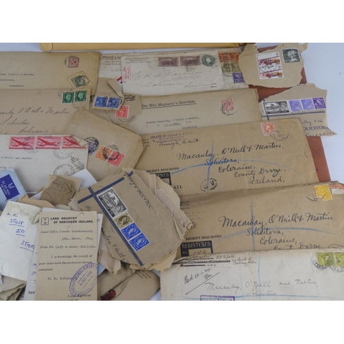 213 - A large lot of used postage stamps.