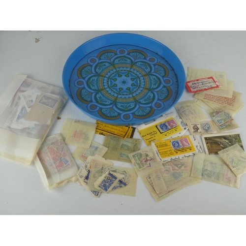 214 - A vintage tray and a mixed lot of collectors stamps.