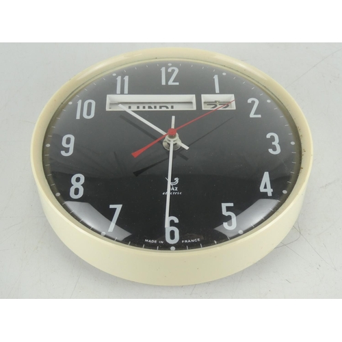 219 - A French Jaz Electric wall clock.