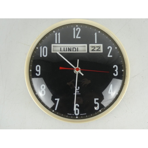 219 - A French Jaz Electric wall clock.