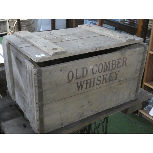 228 - A large vintage wooden crate 'Old Comber Whiskey' measuring 67cm x 43cm x 38cm.