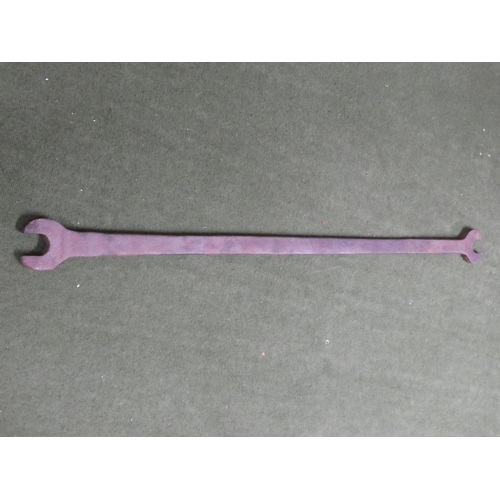 238 - A large vintage spanner, measuring 125cm.