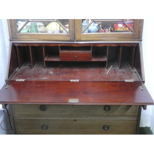 243 - A large mahogany writing bureau/desk bookcase.