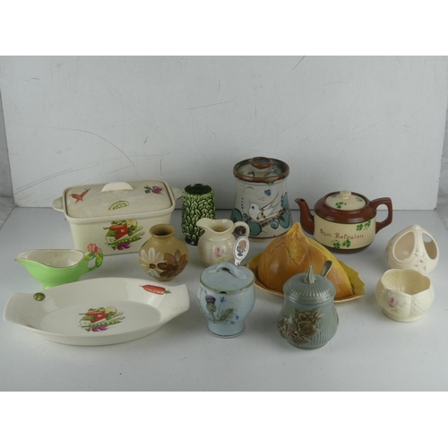 244 - A lot of ceramics to include a Carrig Ware Irish teapot, a Royal Winton butter dish and more.