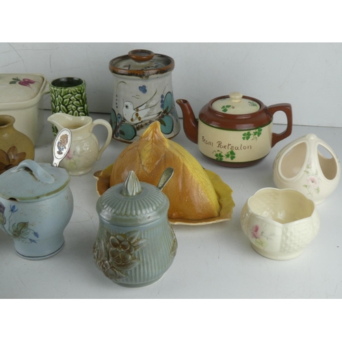 244 - A lot of ceramics to include a Carrig Ware Irish teapot, a Royal Winton butter dish and more.