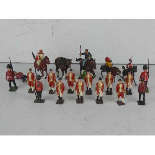 245 - A collection of vintage enamel hand painted military figures etc.