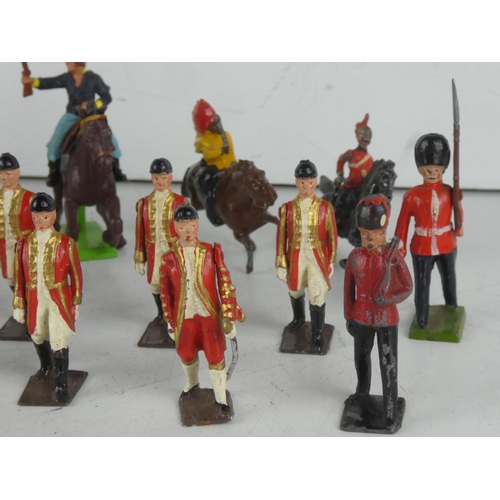 245 - A collection of vintage enamel hand painted military figures etc.