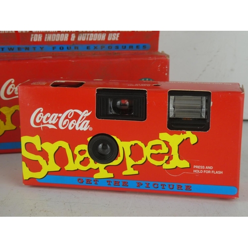 247 - A vintage boxed Coca Cola Snapper camera.