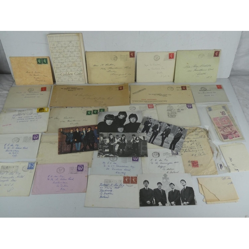 250 - A collection of vintage postcards of The Beatles, The Rolling Stone, used postage stamps, bank notes... 